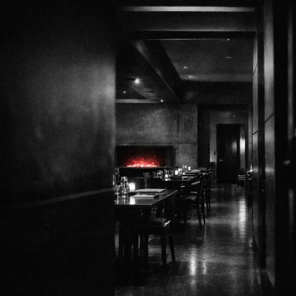 Shadowed Chance and Hearth interior with ember-lit dining tables and a darker doorway beyond